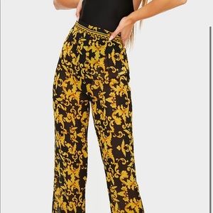 Black chain beach print flares